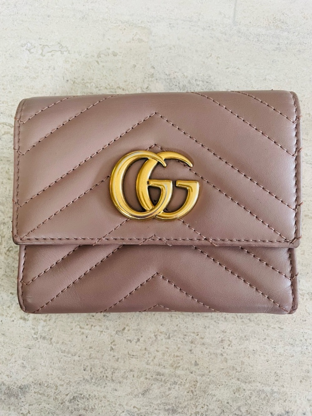 Like New GUCCI
Beige Quilted Leather Marmont Compact Tri-Fold Wallet
